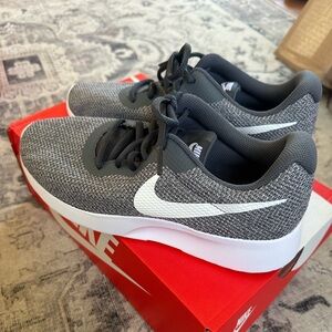 Nike, women’s size 8.5. Never worn.